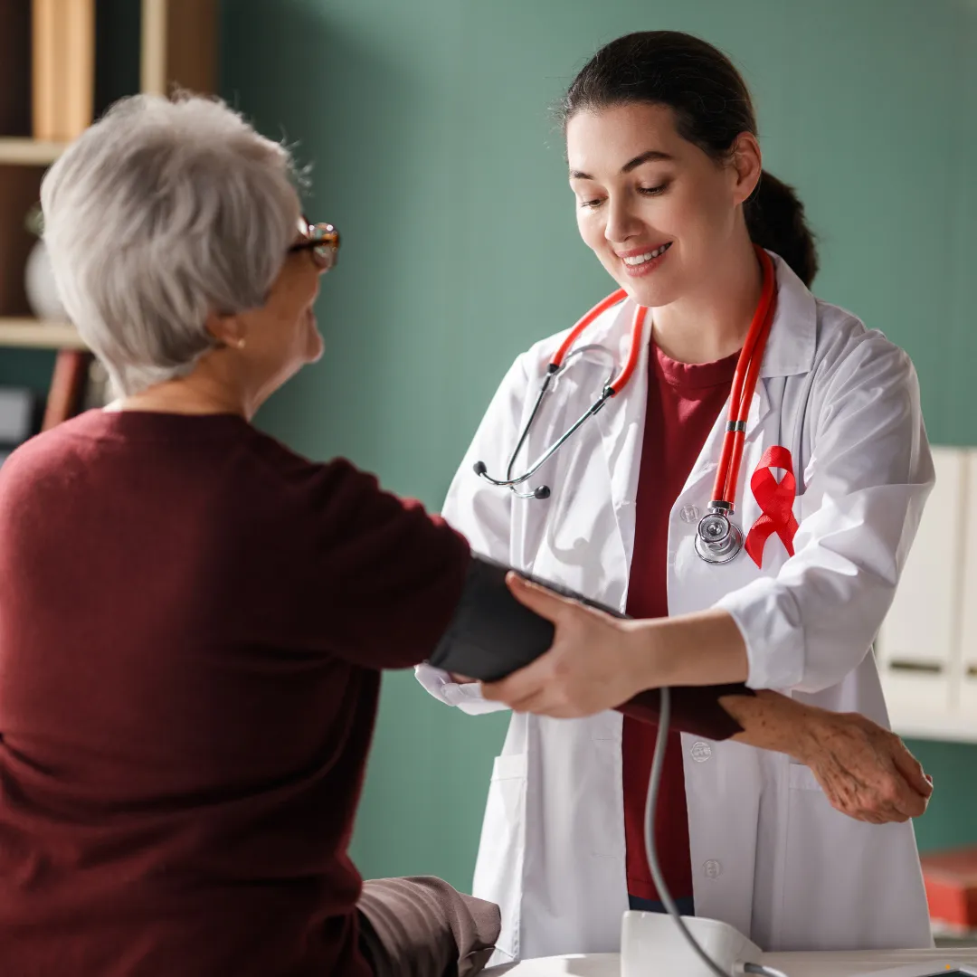 Ambulatory care pharmacist consulting a patient in a modern outpatient clinic